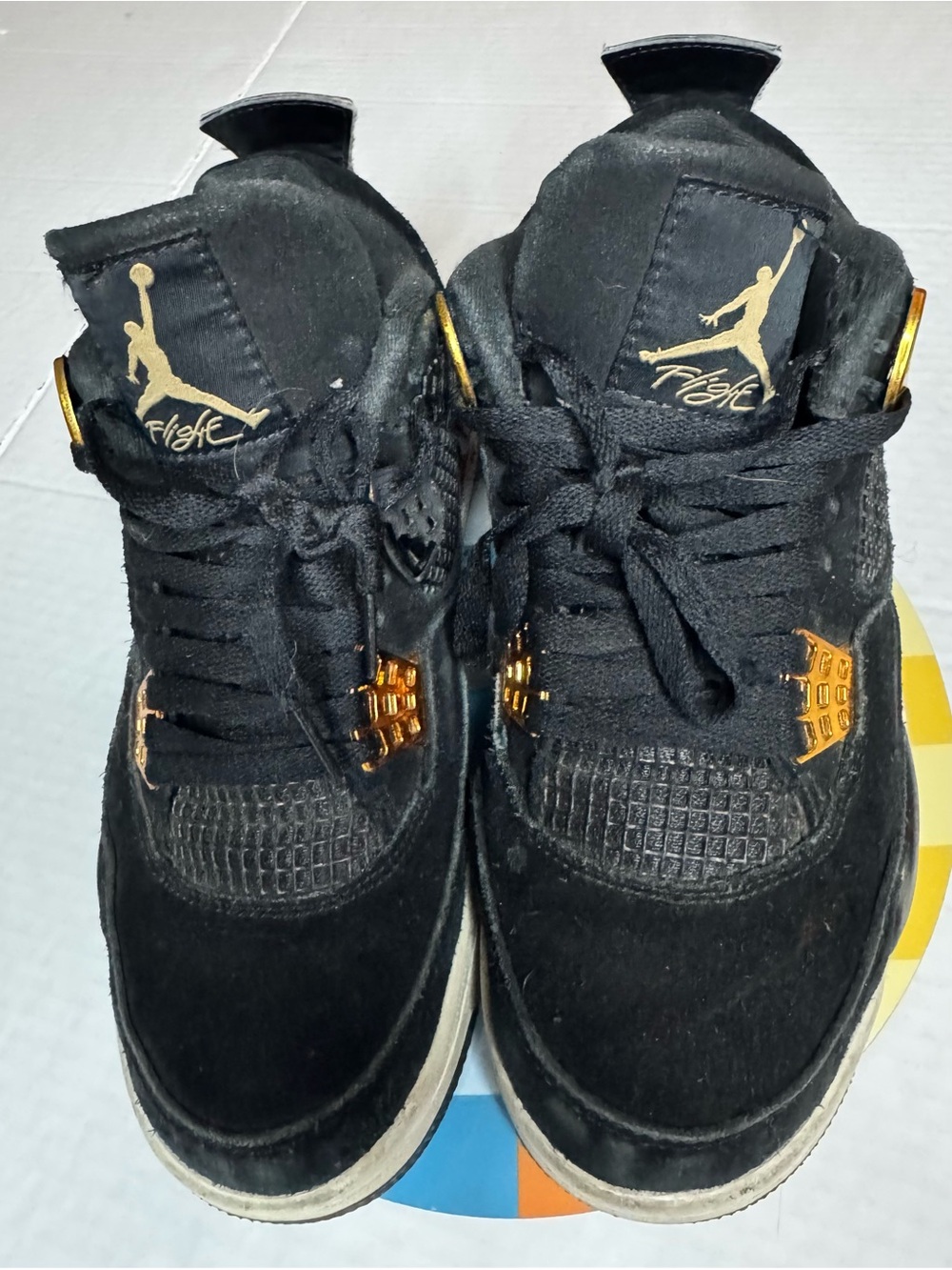 Jordan Black and Gold Retro 4 Sneakers